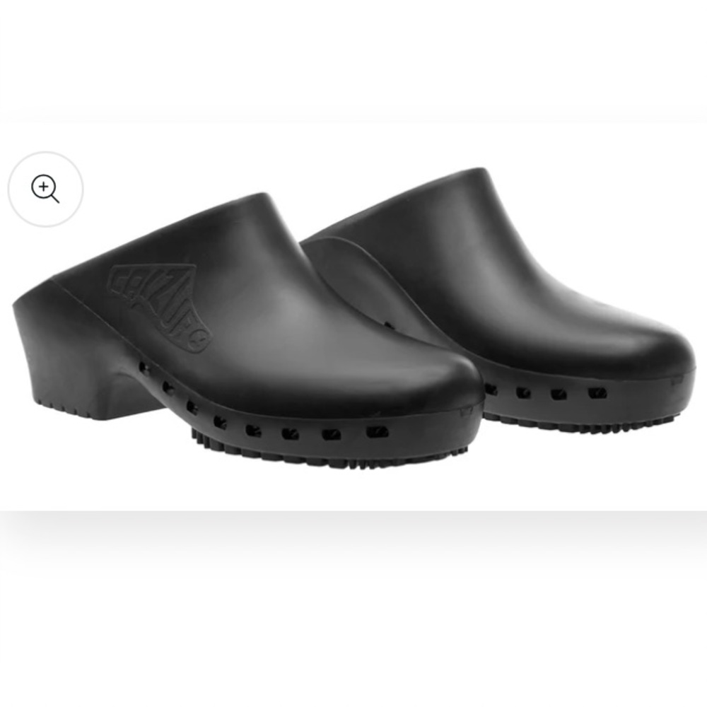 Black Calzuro clogs. New never worn.